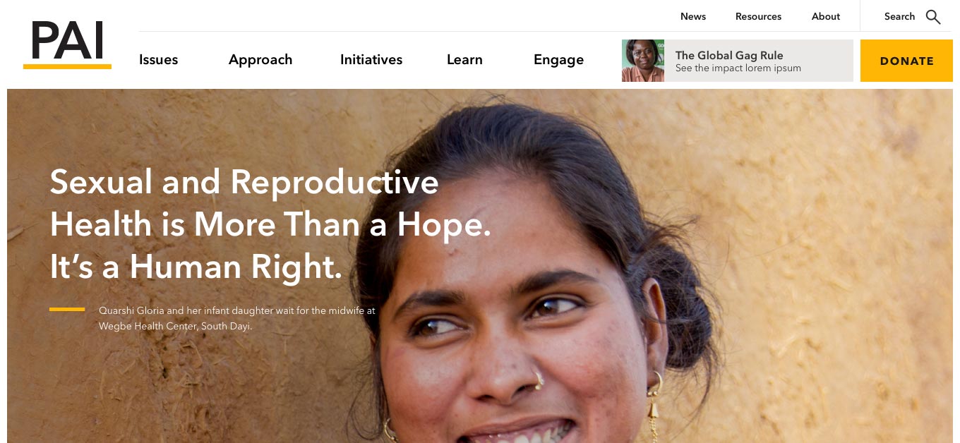 PAI homepage hero showing a woman in India looking off camera and smiling