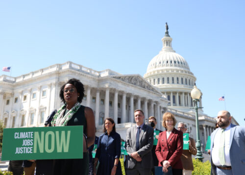 Black woman giving a speech outside the Capitol building