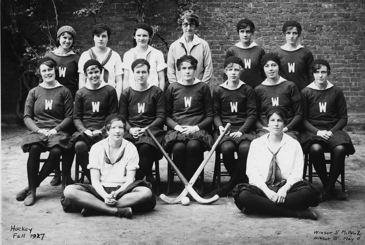 Historic black and white group portrait of the Winsor School hockey team.